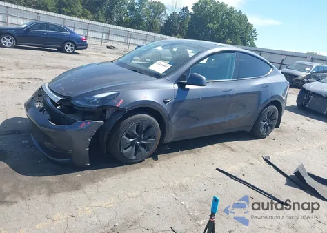 2023 Tesla Model Y Awd/Long Range Dual Motor All-Wheel Drive z USA, uszkodzony, nr VIN 7SAYGDEE2PF791592